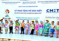 Students perform a traditional dance to display their gratitude for their helmets