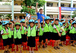 Students receive helmets and traffic safety lessons at Helmets for Kids launch ceremony
