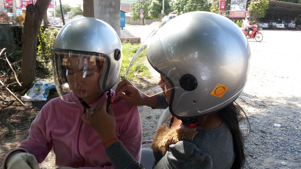 Police will begin fining for un-helmeted passengers in the coming year