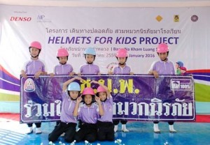 Schoolchildren enact a road safety skit during the kick-off ceremony at Baan Na Kham Luang School.