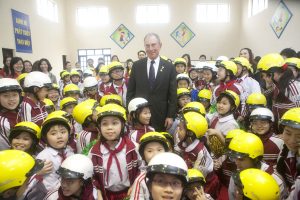 Michael R. Bloomberg shown here taking part in the kick-off event for a Helmets for Kids project in Hanoi in 2012. 