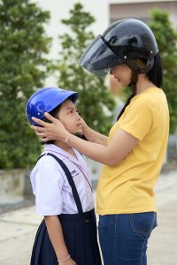 A mother and daughter are photographed during a visit to Thesaban Tambon Tha Phae School and Rajaprajanugroh 4 School in Nakhon Si Thammarat province.