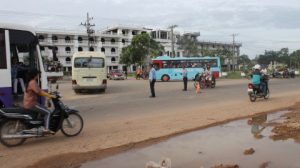 Buses are slowly replacing flat-bed trucks as worker transportation vehices in Bavet, Cambodia